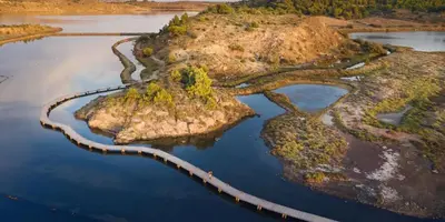 an aerial view of an island in the water at Grande villa de charme proche de la mer in Peyriac-de-Mer