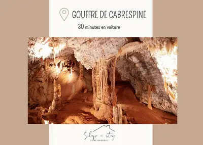 a picture of a cave with the words minutes an adventure at Le Canal - Appartement avec vue 4 personnes in La Redorte