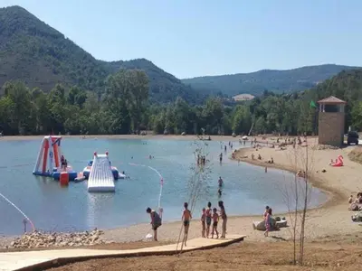 a group of people at a beach with a slide at Mountain Retreat w Terrace in Quillan