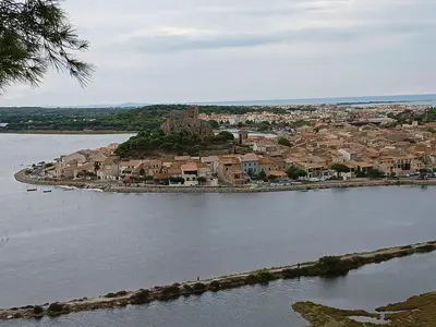 an island in the middle of a body of water at Le Bleu du Sud in Gruissan