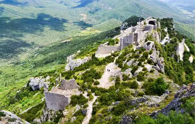 an old castle on the side of a mountain at 2 Bedroom Gorgeous Home In Saint-Laurent-De-La-Ca in Saint-Laurent-de-la-Cabrerisse
