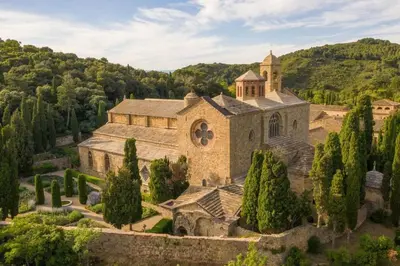 an aerial view of a church with a tower at Le Bambou Wifi Proche des pontons et du Doul in Peyriac-de-Mer