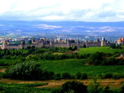 a large castle on top of a green field at Maison Marianne Comfortable holiday residence in Ferrals-lès-Corbières