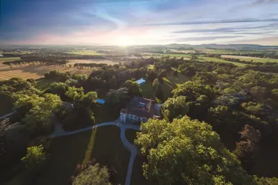 an aerial view of a house in the middle of a forest at Gîte des Cathares 2 personnes in Lempaut