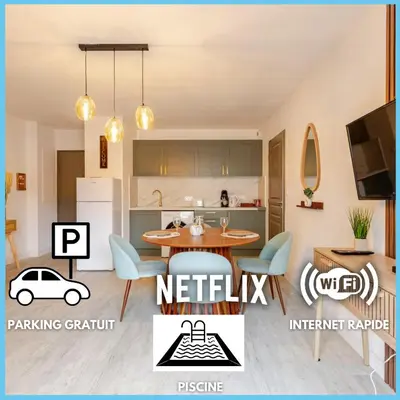 a kitchen and a living room with a table and a car on the floor at Le Cosy Bernard , Parking, Piscine, Netflix in Carcassonne