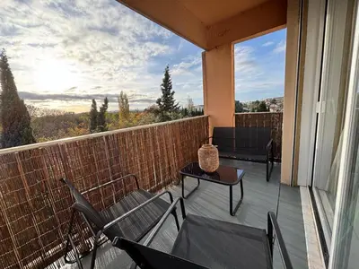 a view of a forest of trees and bushes at Appartement familial avec parking privatif in Carcassonne