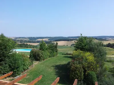 a view of a garden with a swimming pool at Fossat in Villautou