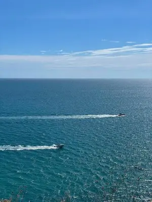 two planes in the water in the ocean at L'esprit Garrigue Caves in Caves