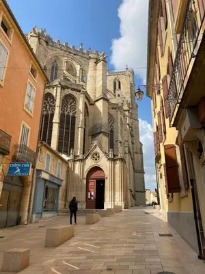 a man standing in front of a church at Logement coeur de ville in Narbonne