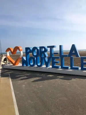 a large sign for a north nowhere sign on a road at Chez Eugénia & Frédéric in Port-la-Nouvelle