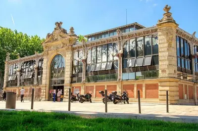 a building with motorcycles parked in front of it at Villa Valara in Narbonne
