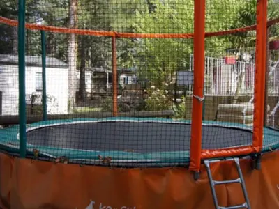 a tennis court in a batting cage at Mobil-home confortable avec terrasse pour 4 personnes à Sournia - API-1-52-622 in Sournia