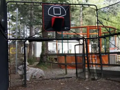 a batting cage with a sign on top of it at Mobil-home avec Terrasse Accueillant 6 Pers - API-1-52-631 in Sournia