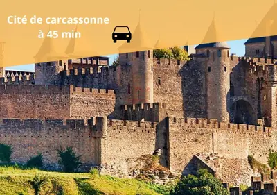 a picture of a castle with a car on it at Heart of Oc Mistral Elegant & Spacious Center Train Station in Narbonne