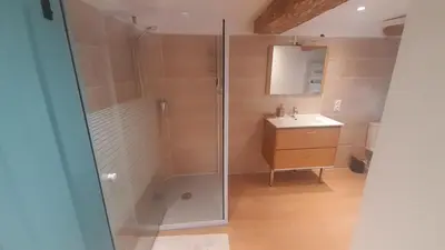 a bathroom with a shower and a sink at La commanderie in Homps