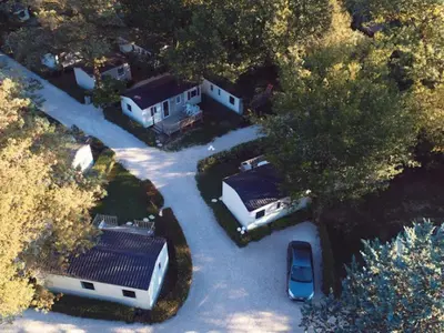 an aerial view of a house with a parking lot at Mobil-home avec Terrasse à Axat - API-1-52-1004 in Axat