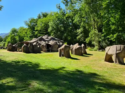 a group of tents and elephants in a field at Chalet 6 pers avec Terrasse & Jardin - API-1-52-1952 in Pamiers