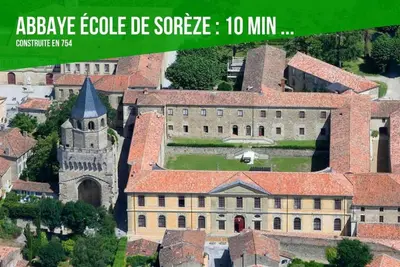 an aerial view of a large building with a tower at TERRASSE du GET in Revel