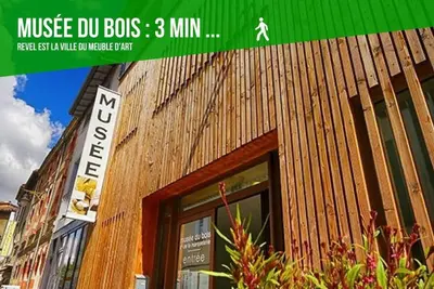 a sign on the side of a building at TERRASSE du GET in Revel
