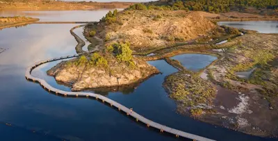 an aerial view of an island in the water at La Lagune in Bages