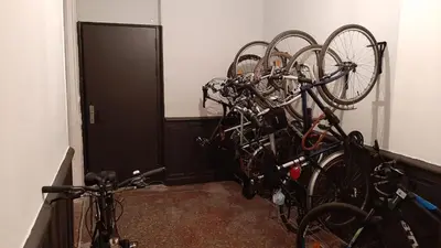 a bunch of bikes parked in a room at Le Selamat, Logis XXL au calme avec Terrasse in Carcassonne