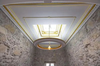 a ceiling with a light in a room at Chambre Orientale Chérazade Maison de L'Église in Narbonne